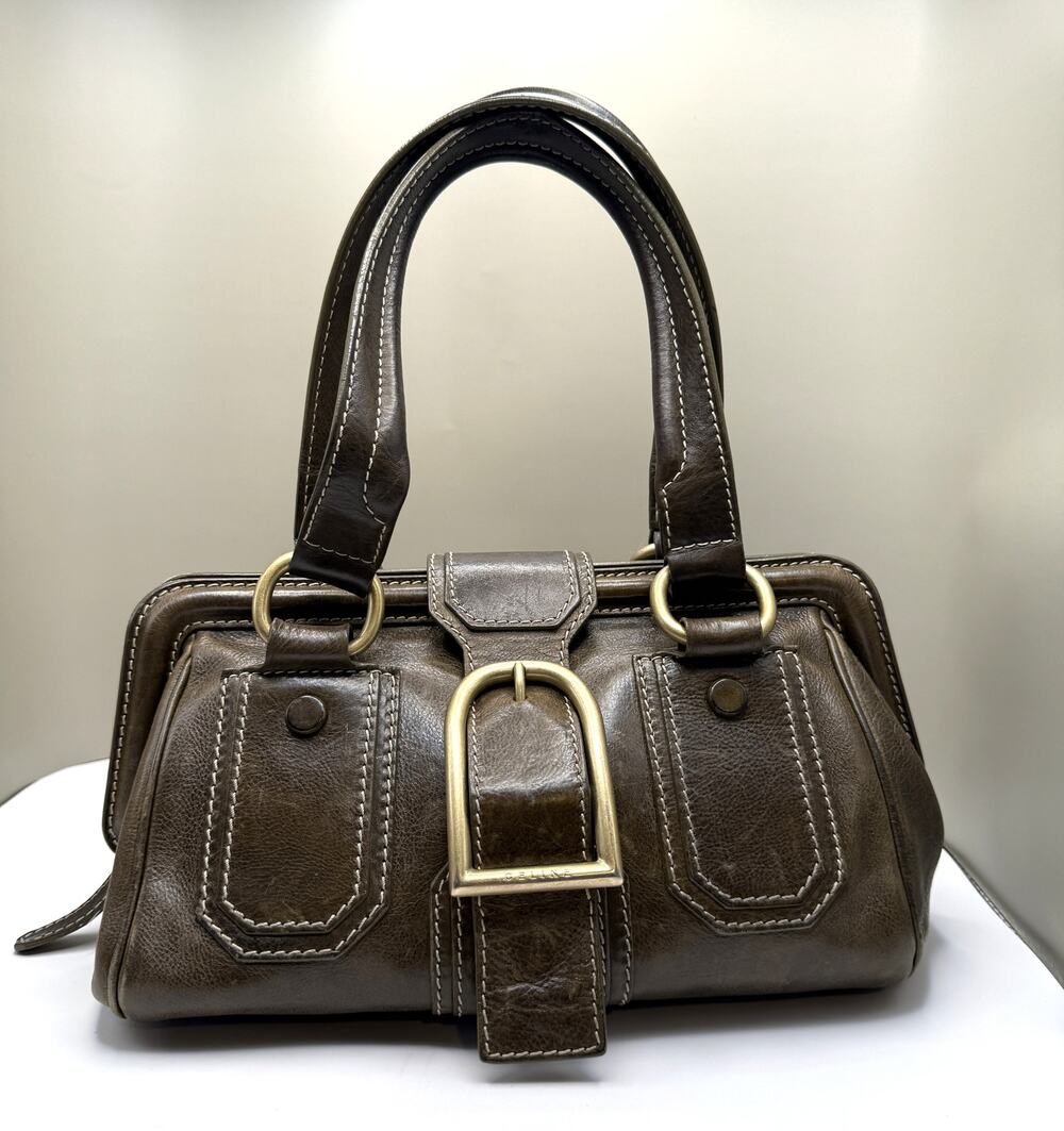 Vintage Celine Ella Frame Bag crafted from brown green leather brass hardware
